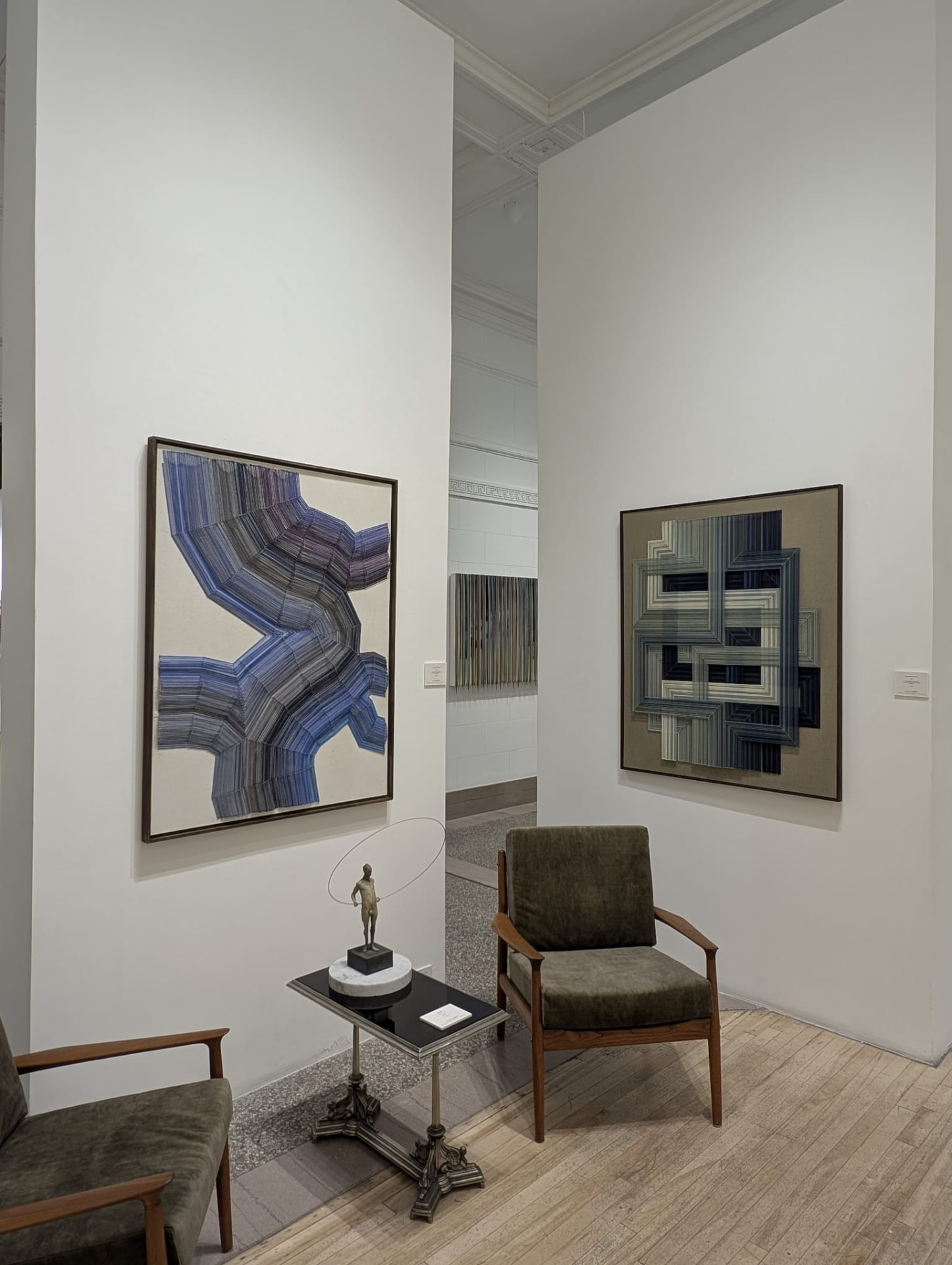 Installation view of two thread works in the group exhibition at Galerie Le Royer in Montreal